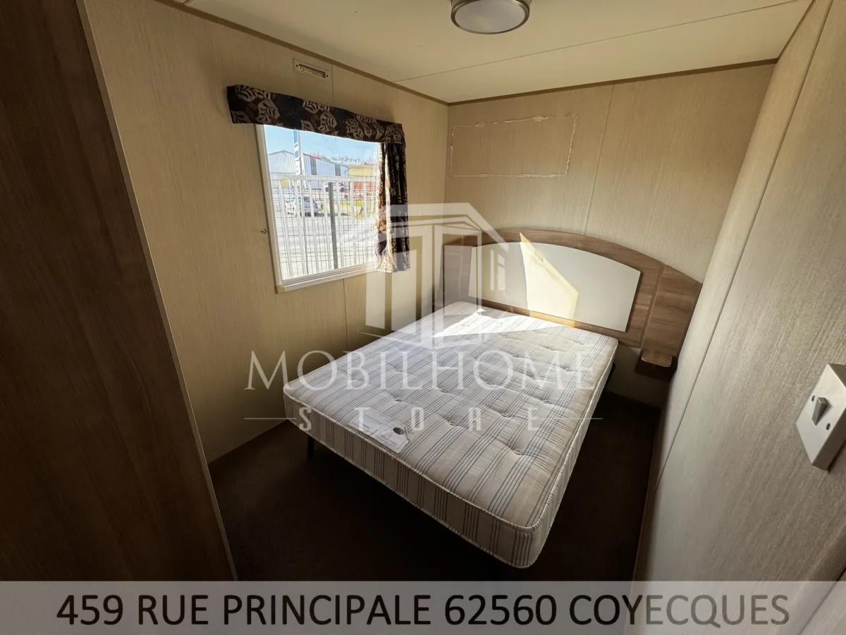 Photo d'une des chambres avec un lit double du mobil-home ABI HORIZON